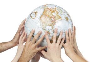 hands holding the globe
